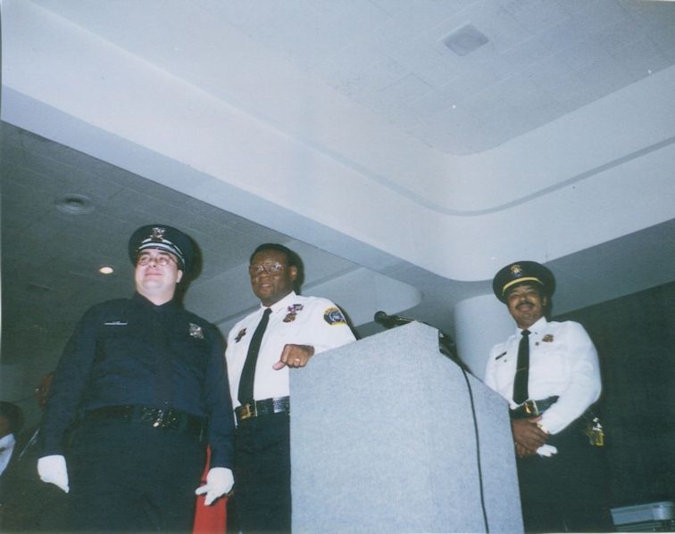 Officer Sean Lane with Detroit Chief of Police Isaiah McKinnon